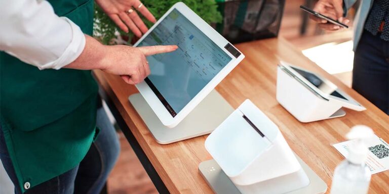Clover Station POS with customer-facing display at checkout