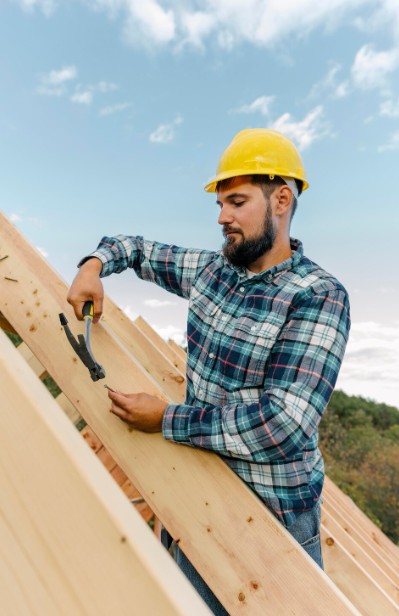 Home services contractor working on a roof repair project