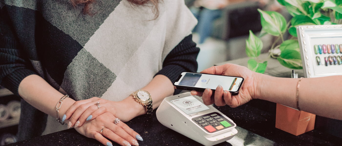Clover Compact countertop terminal with contactless payment at a service business