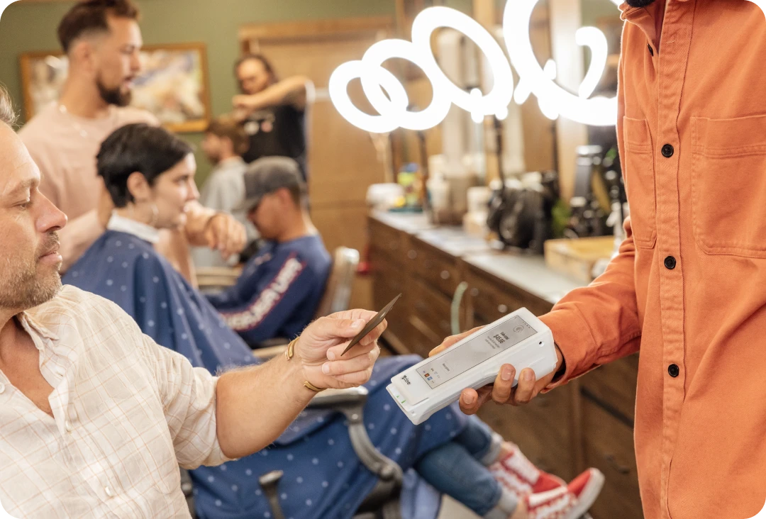 Clover Flex used for contactless payment in a service shop